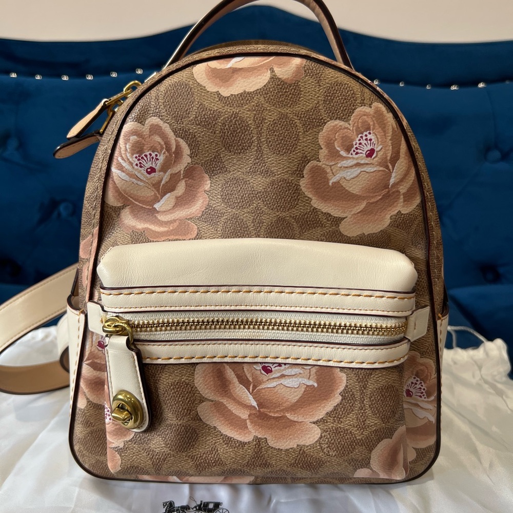 Coach Rose print mini backpack.